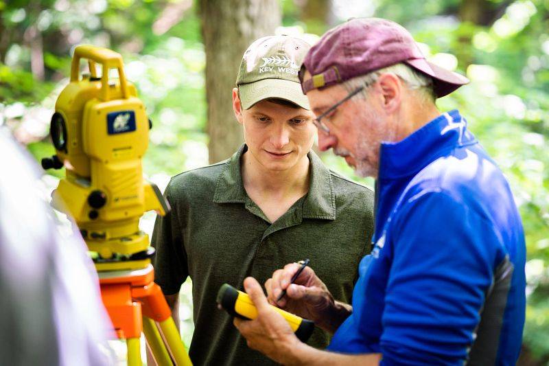 A GVSU Biology professor conducts research with a graduate student.